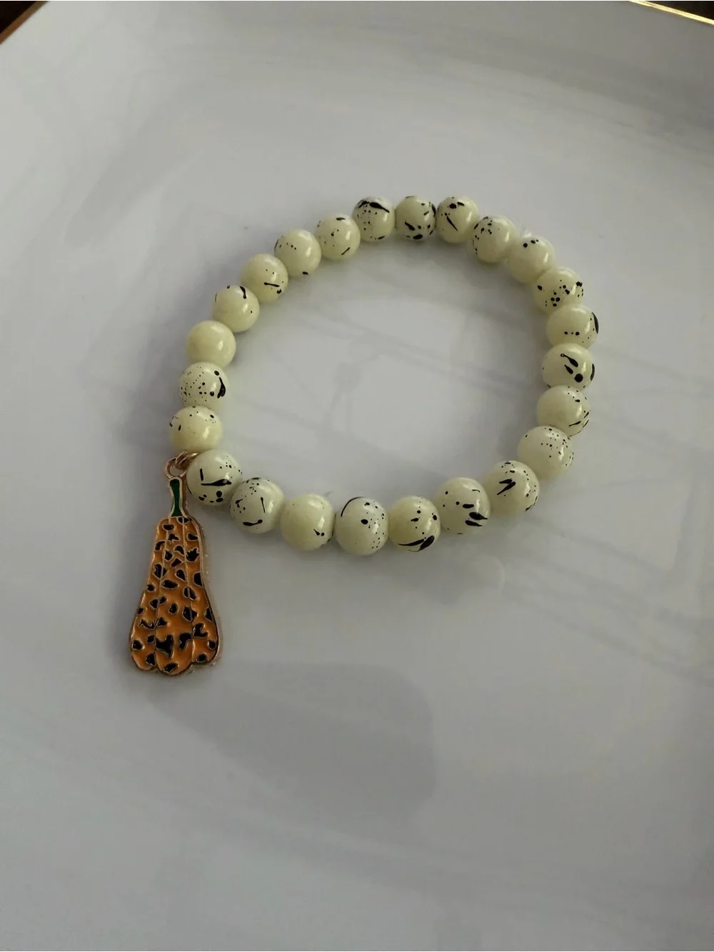 Spotted Pumpkin Charm Handmade Cream Beaded Bracelet